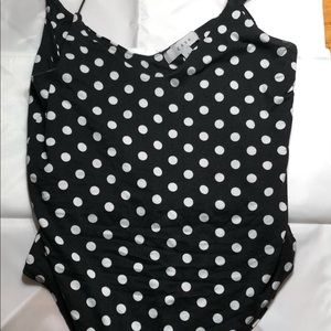 Polka dot body suit, fits large but sized small.
